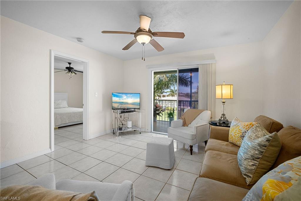 Tiled living area with ceiling fan