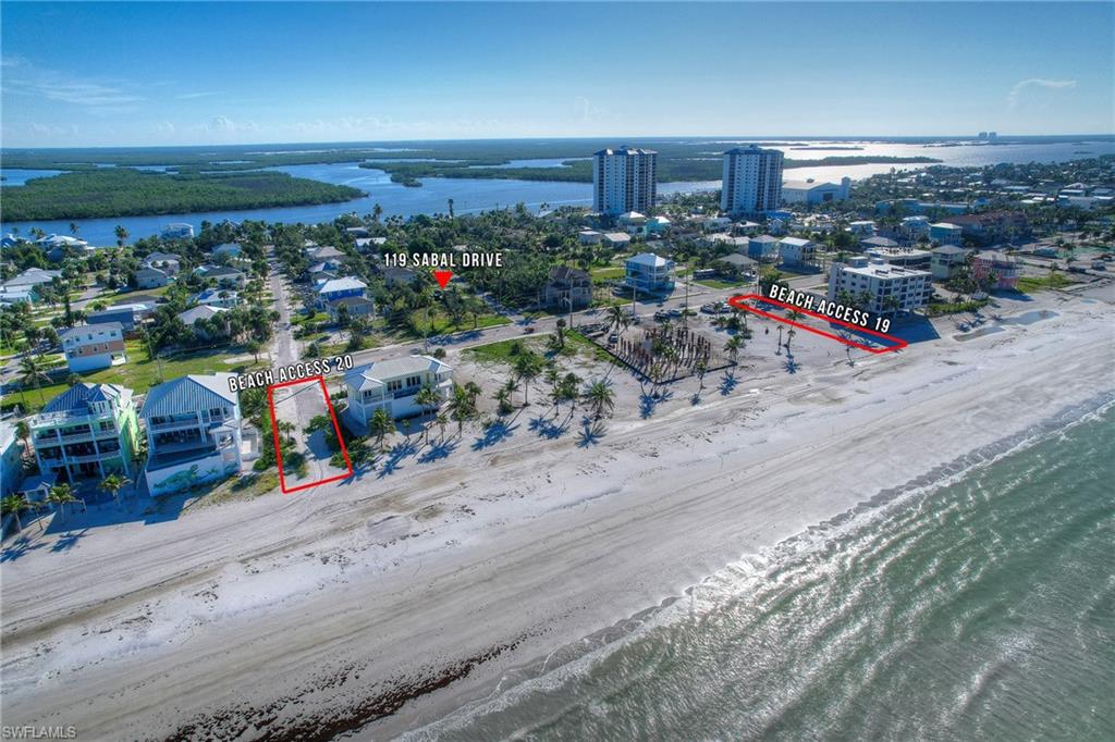 Aerial overview of property's location featuring a large body of water and property boundaries highlighted