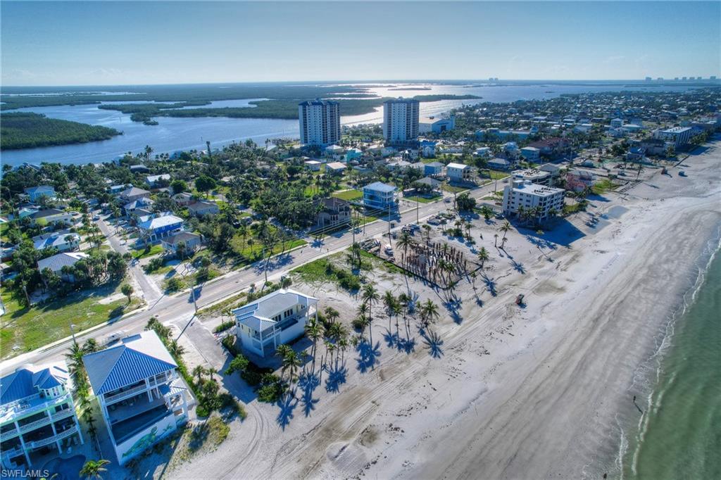 View of urban area with unending shoreline and nearby suburban area