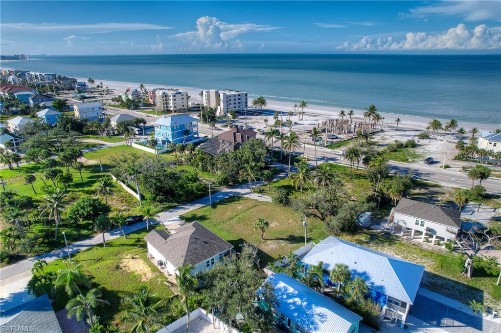 Drone / aerial view of waterfront with a beach