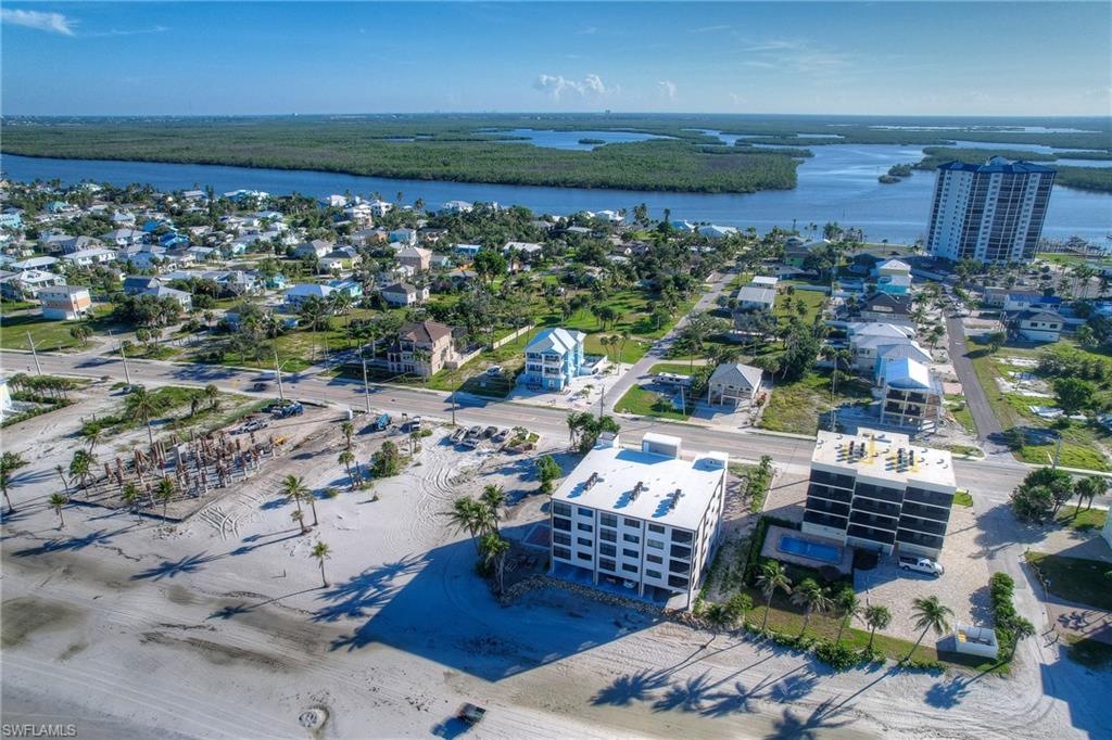 Aerial view of residential area with a large body of water