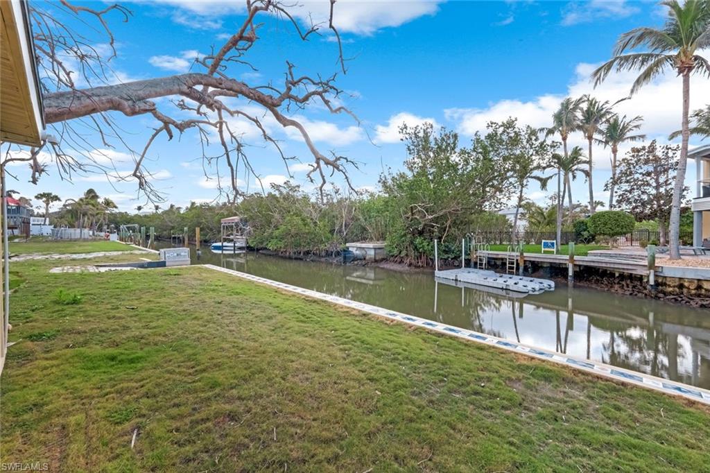 View of canal with boat ramp, view of mangroves