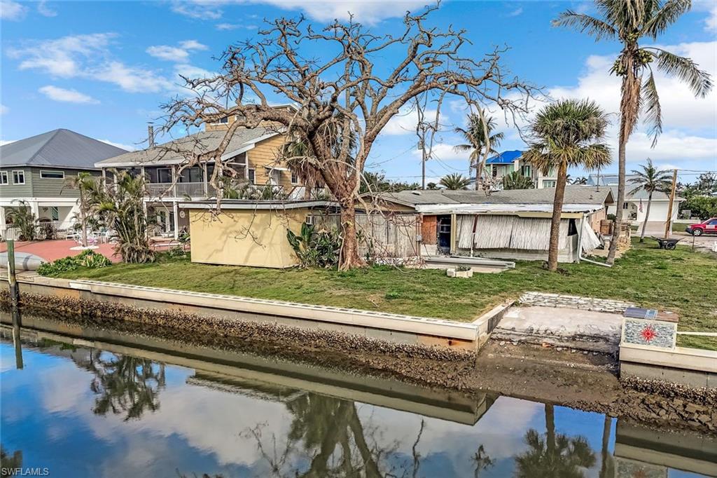 Back of house with view of the canal