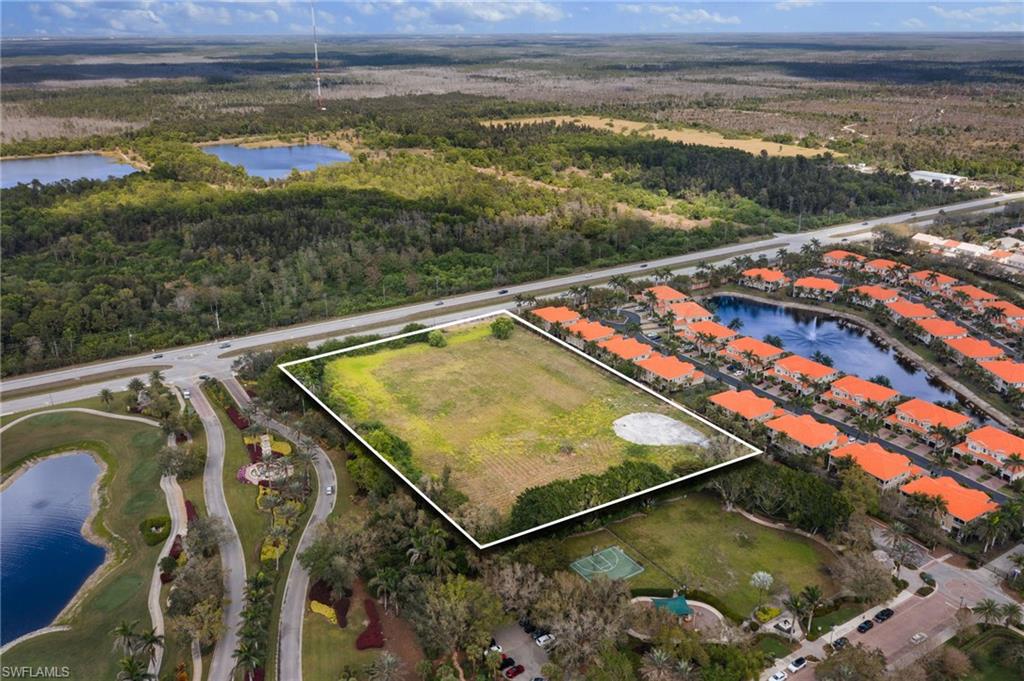 Bird's eye view with a view of trees and a water view