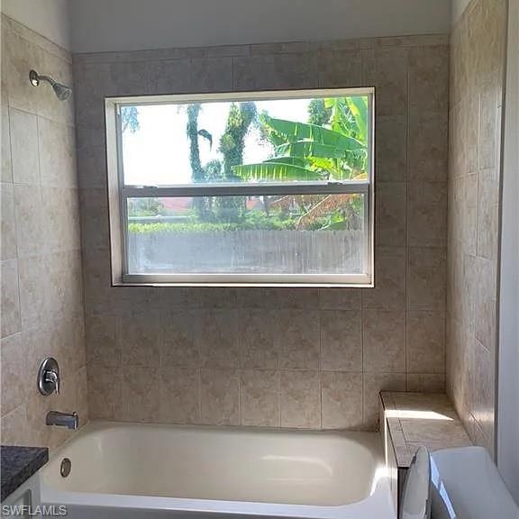 Full bath with vanity