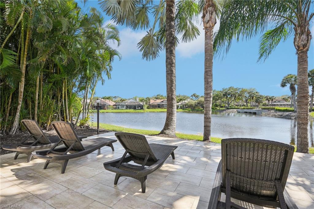 View of patio / terrace with a water view