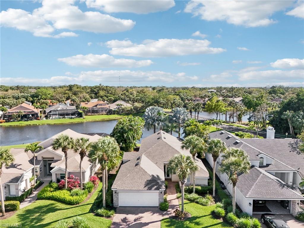 Drone / aerial view featuring a residential view and a water view
