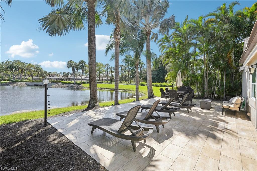 View of patio / terrace with a water view