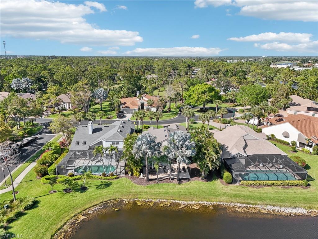 Bird's eye view with a water view and a residential view