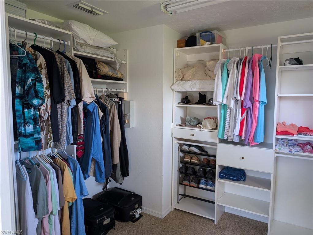 Very large walk-in owner's closet with built-ins.
