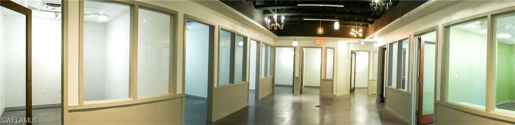 Hall with concrete flooring