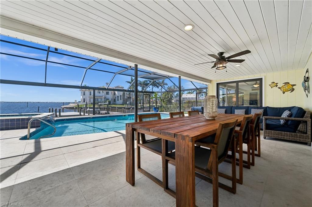 Enjoy relaxing on the covered lanai overlooking the pool and the river