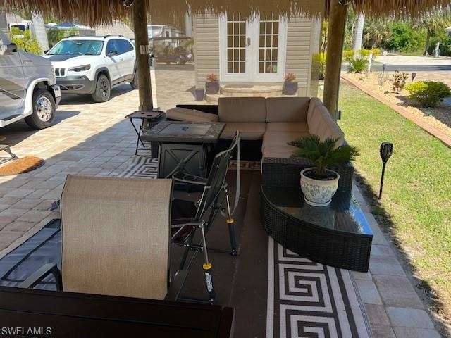 View of patio / terrace featuring outdoor lounge area and french doors