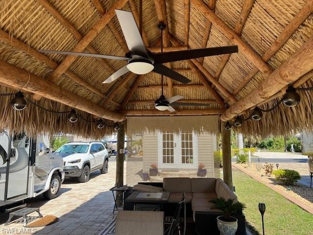 View of patio / terrace featuring a gazebo and a ceiling fan