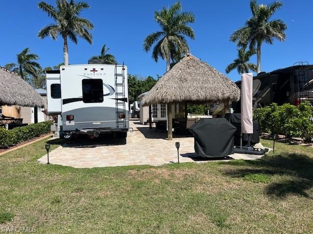 View of yard featuring a gazebo and a patio