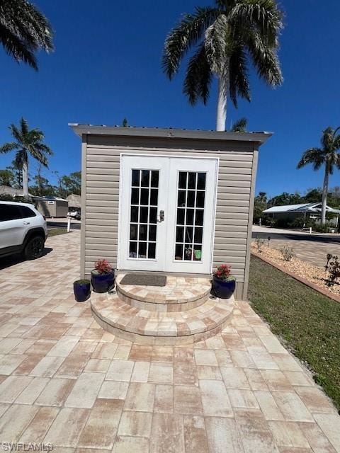 View of outbuilding featuring an outdoor structure