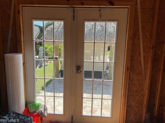 Doorway featuring french doors