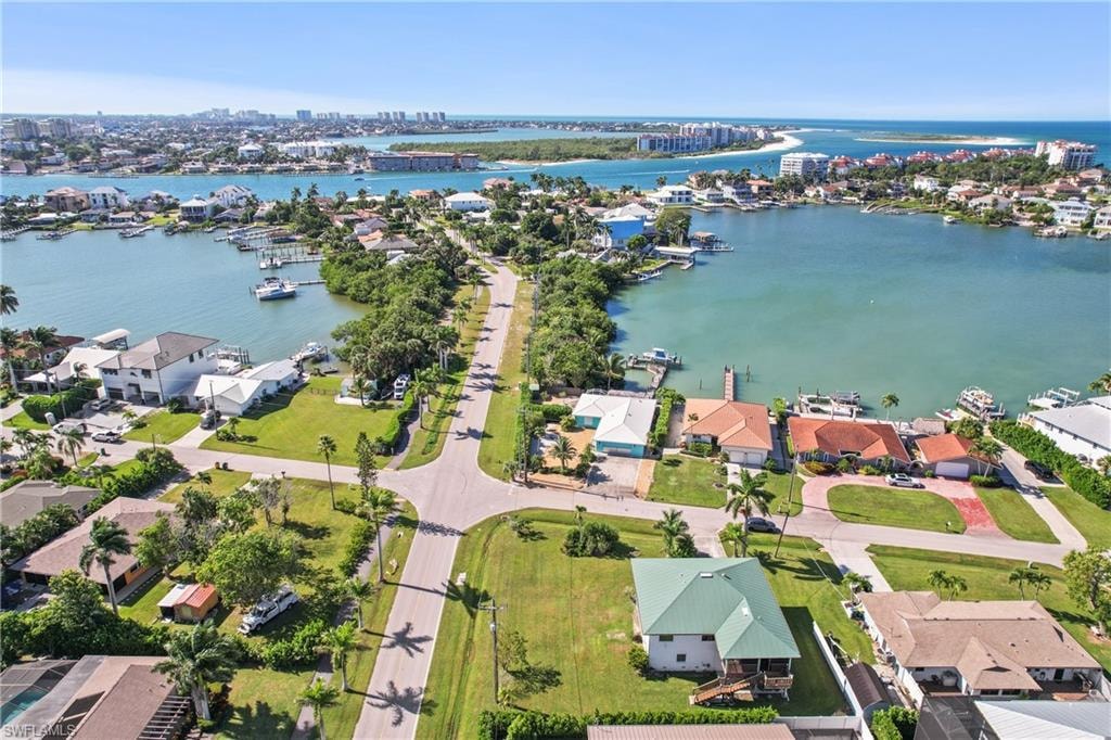 View of urban area featuring nearby suburban area and a nearby body of water