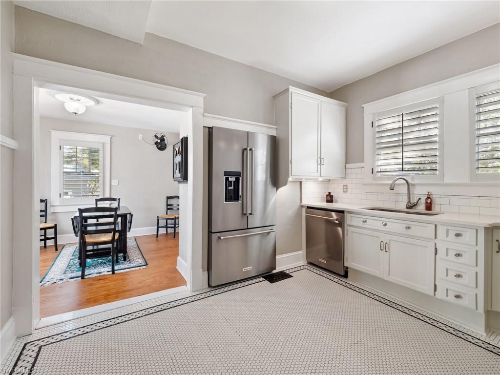 The kitchen serves as a beautiful example of how historic character and modern functionality can coexist.