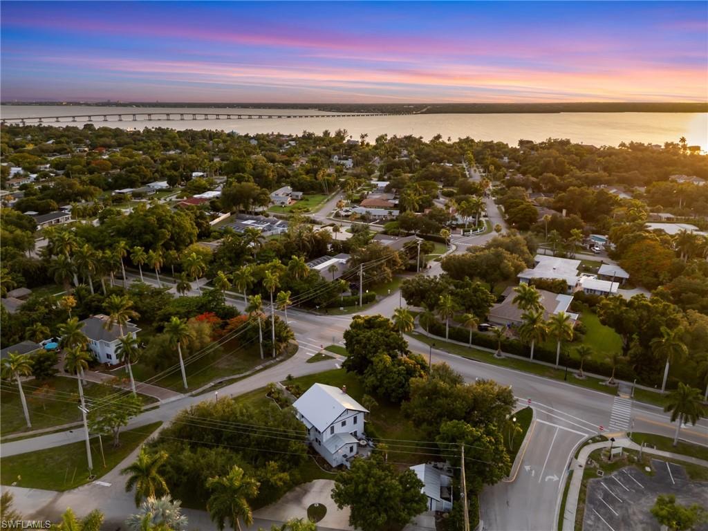 Located just moments from the Caloosahatchee River and outside the flood zone, this property offers both historic charm and peace of mind.