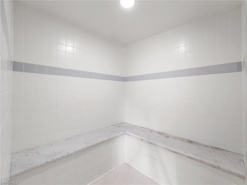A unique detached structure currently serves as a private sauna retreat and offers endless possibilities for future use.