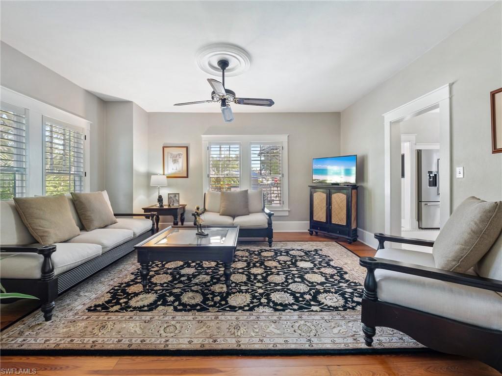 Every detail reflects the home's remarkable preservation, from the gleaming original floors underfoot to the crackling fireplace that remains a centerpiece nearly a century later.