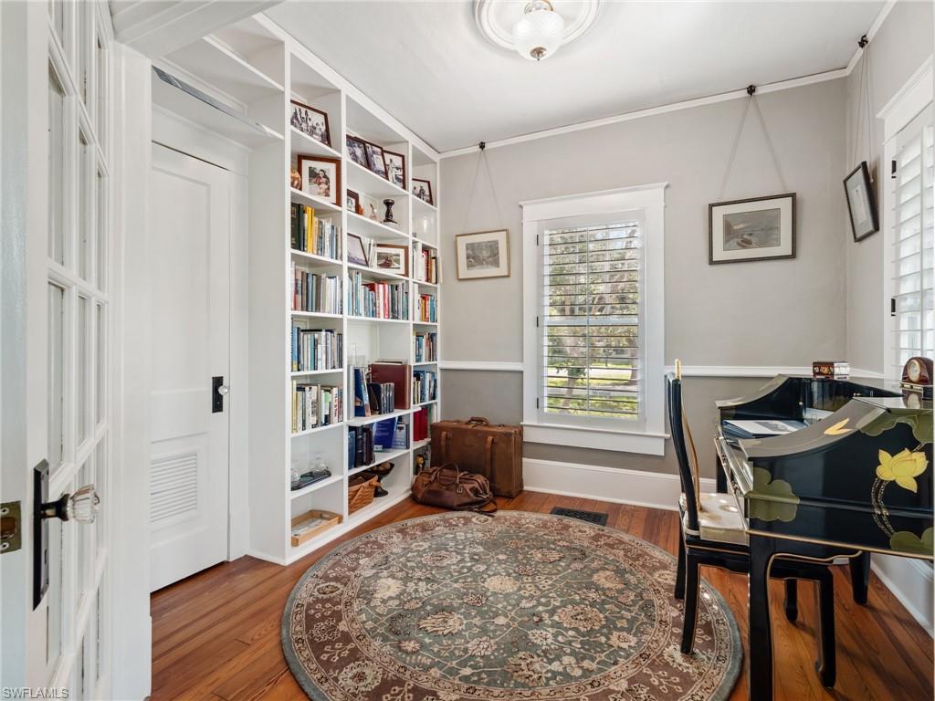 Few homes offer a dedicated library that so perfectly captures the spirit of a historic Colonial residence.