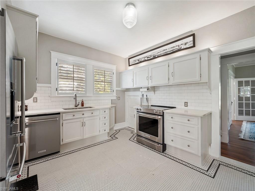 Every cabinet, trim detail, and architectural element reflects a level of craftsmanship rarely replicated today.