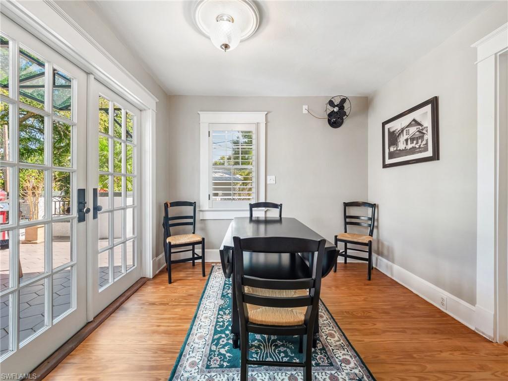 Rich in historic character, the formal dining room is highlighted by a rare original oscillating fan—a fascinating piece of 1925 ingenuity that still draws admiration today.