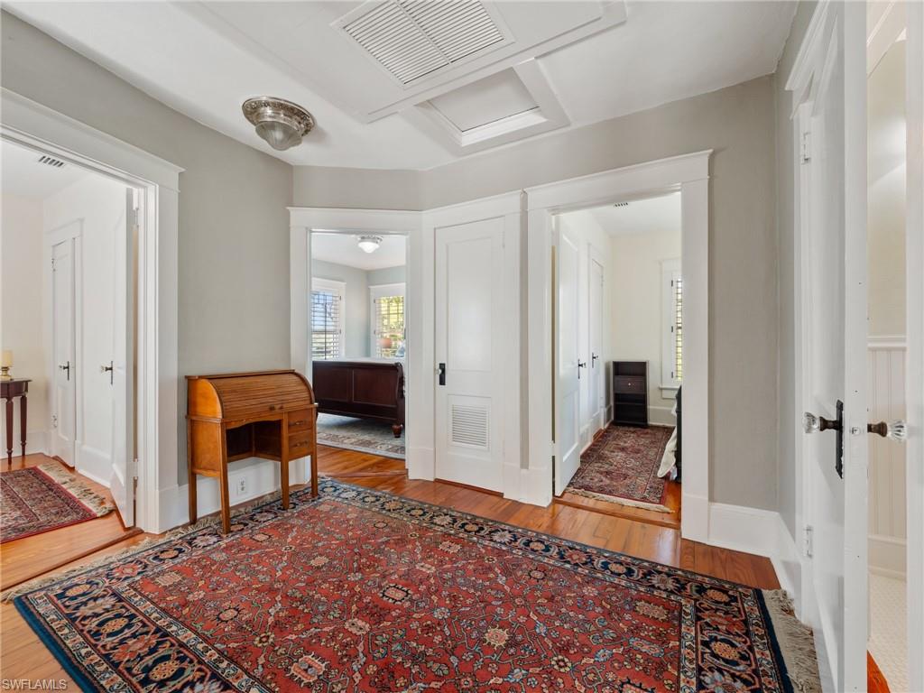 The charming second-floor landing offers easy access to the bedrooms while providing valuable storage through two well-positioned closets.