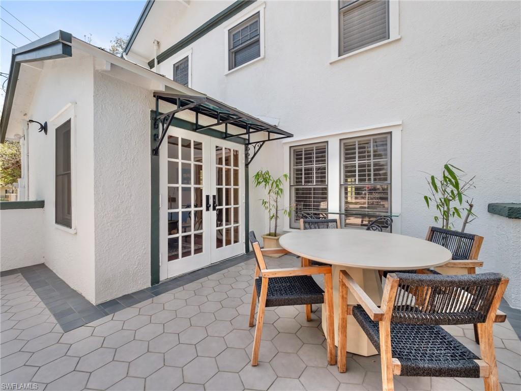 Designed for entertaining, the outdoor living area offers ample space for dining, grilling, and gathering with friends and family.