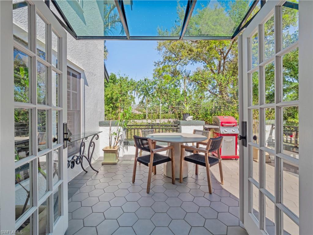 This inviting outdoor space extends the home's living area, providing the perfect backdrop for entertaining, dining, or relaxing under the Florida sky.