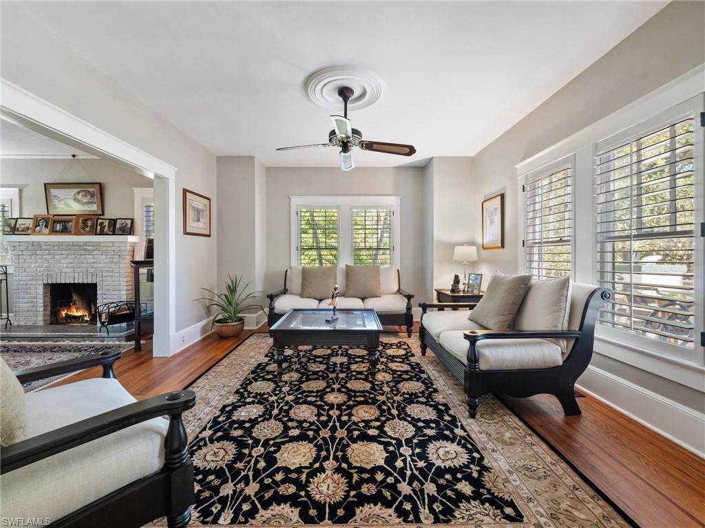 A flexible living area that easily accommodates everything from movie nights to holiday gatherings while preserving the home's historic charm.