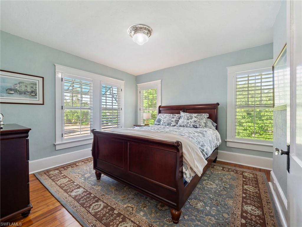 Spacious and filled with natural light, the primary suite captures the elegance and craftsmanship of a bygone era.