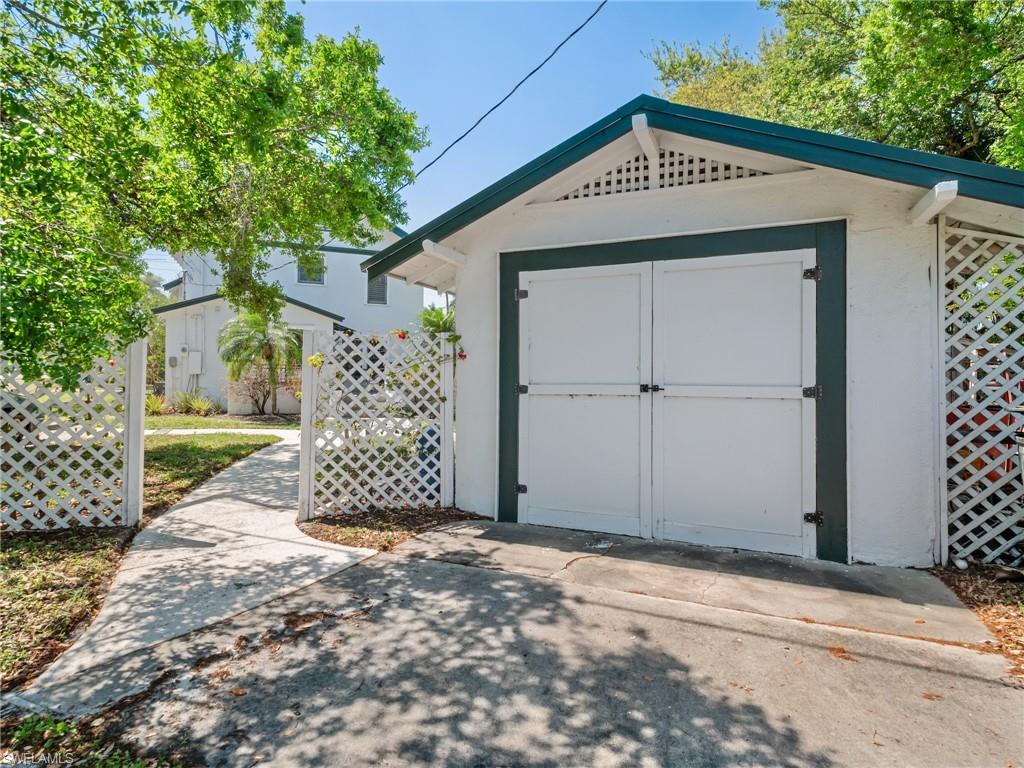 Once home to a Model T automobile, this fascinating space has been thoughtfully repurposed into a spacious laundry and utility room while preserving a unique piece of the property's history.