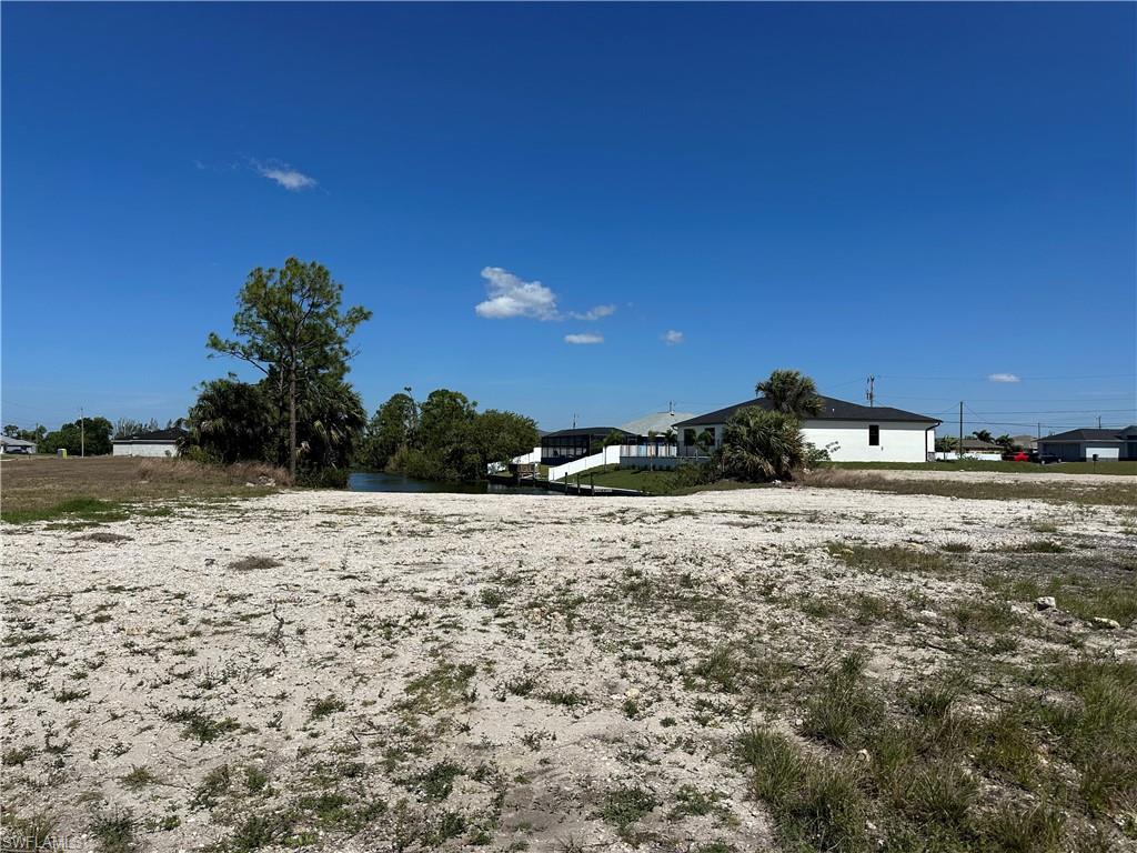 Fresh water canal lot in NE Cape Coral, seawall installed and ready to build on