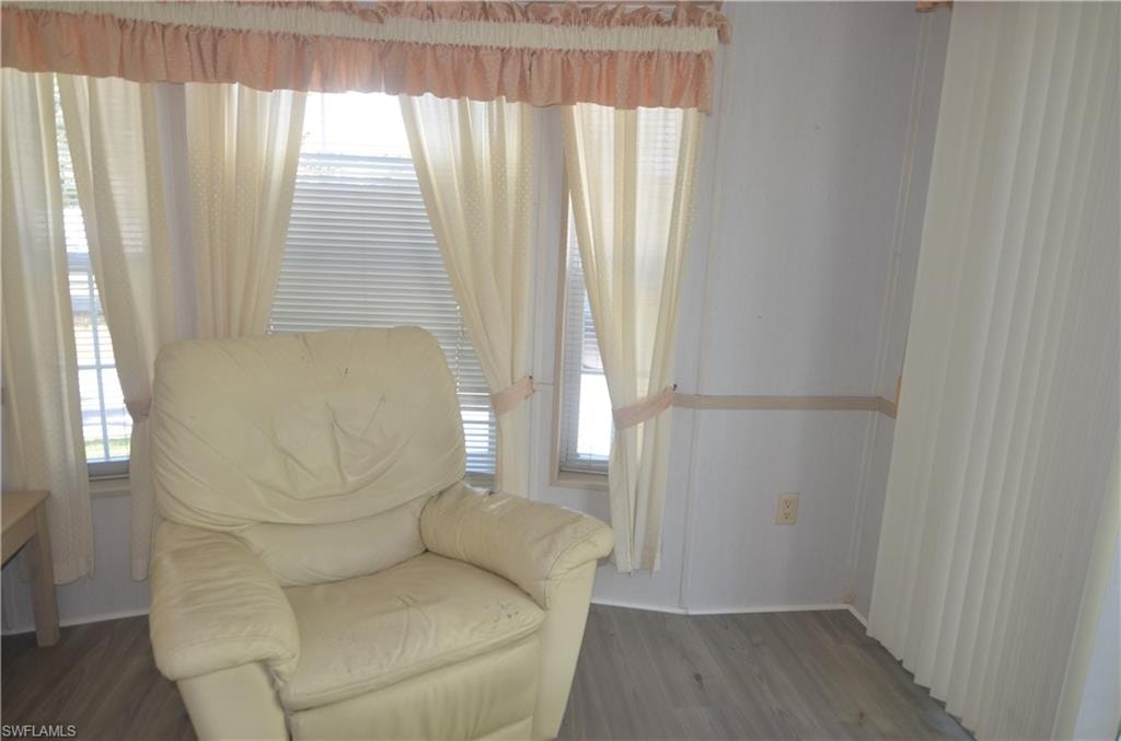 Sitting room with wood finished floors