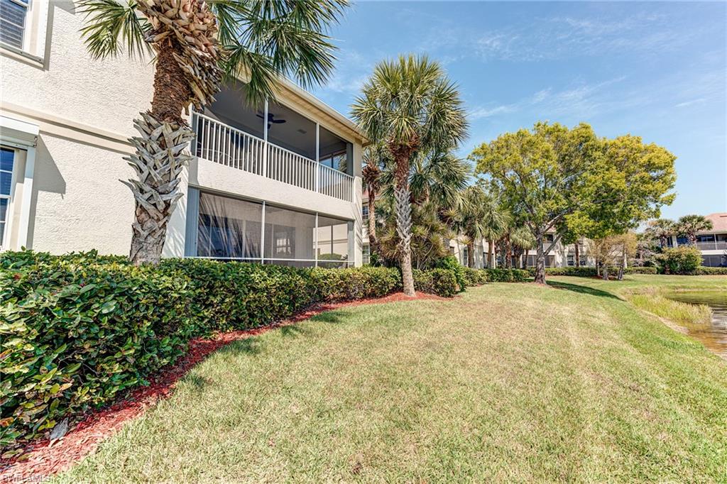 Rear lawn area by lake