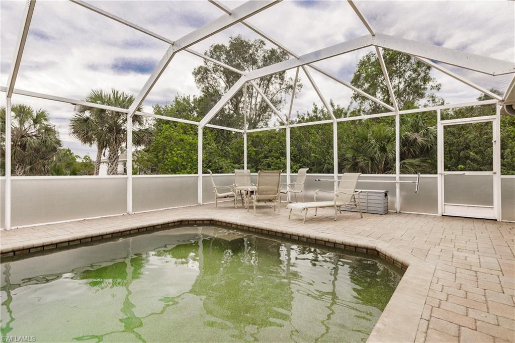 View of swimming pool featuring a nice lounge space