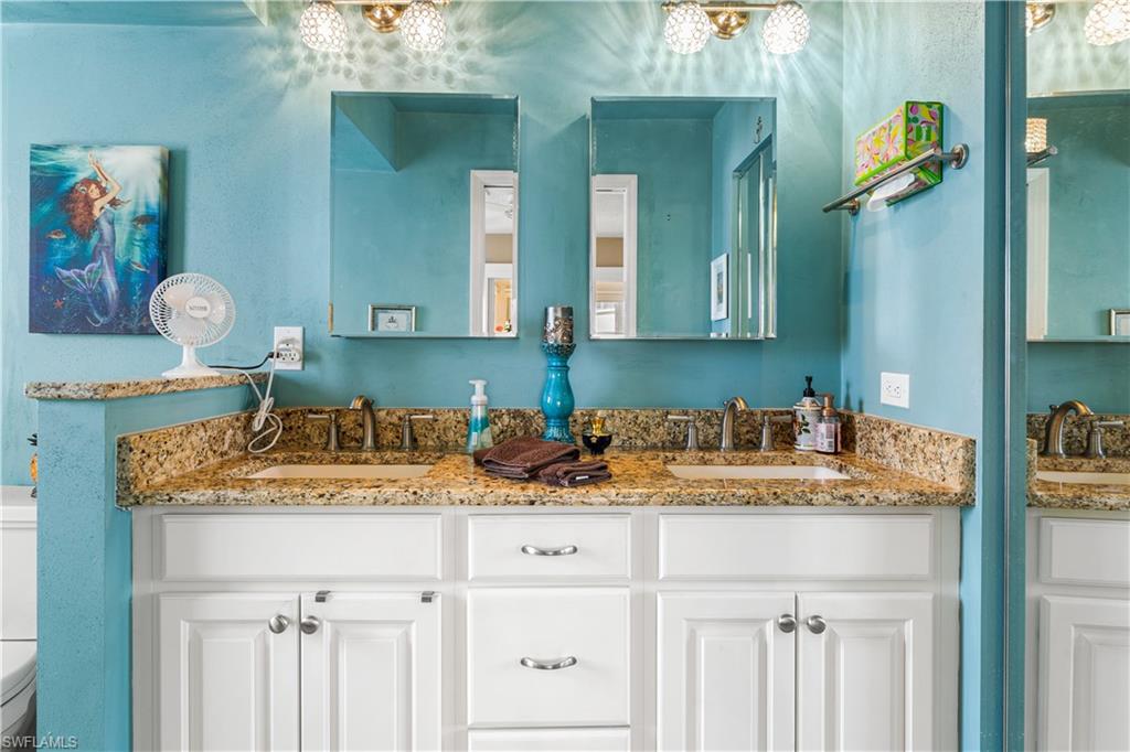Remodeled master bath. Dual comfort height vanities, custom lighting.