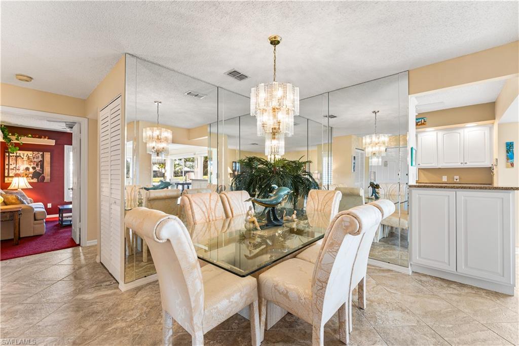 On the right, additional cabinetry has been added with a countertop.  Great for serving and entertaining!