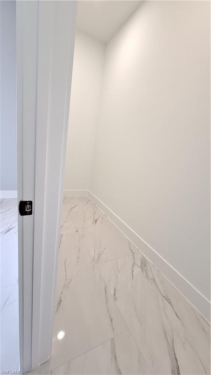 Full bathroom with vanity and a shower stall