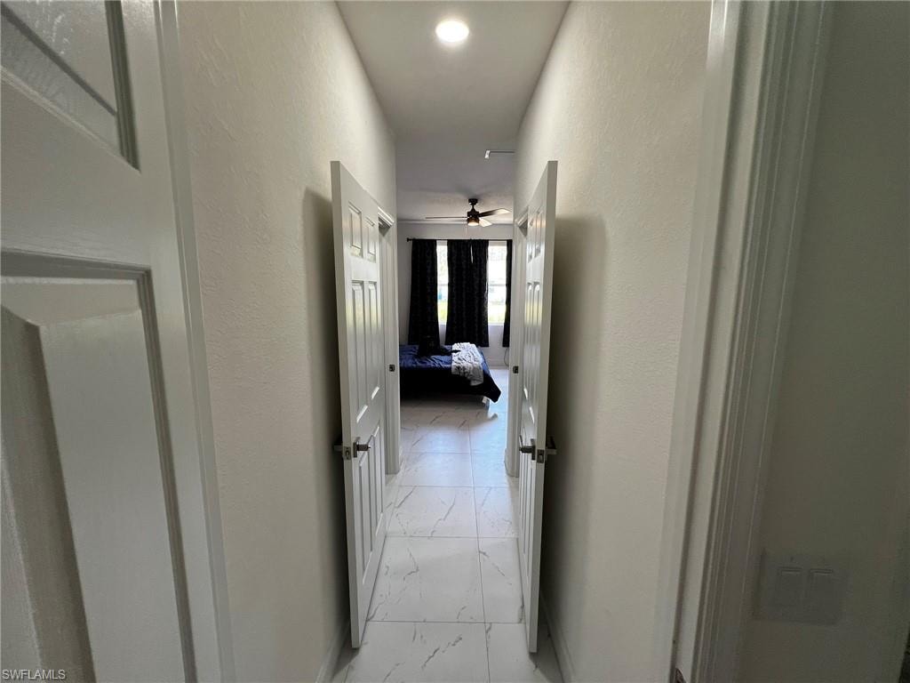Hall with marble finish floor