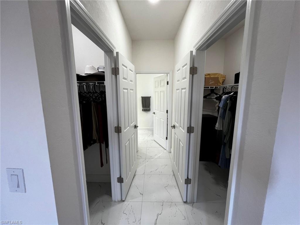 Corridor with marble finish floor