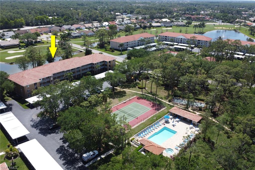Birds eye view of property featuring a residential view and a water view