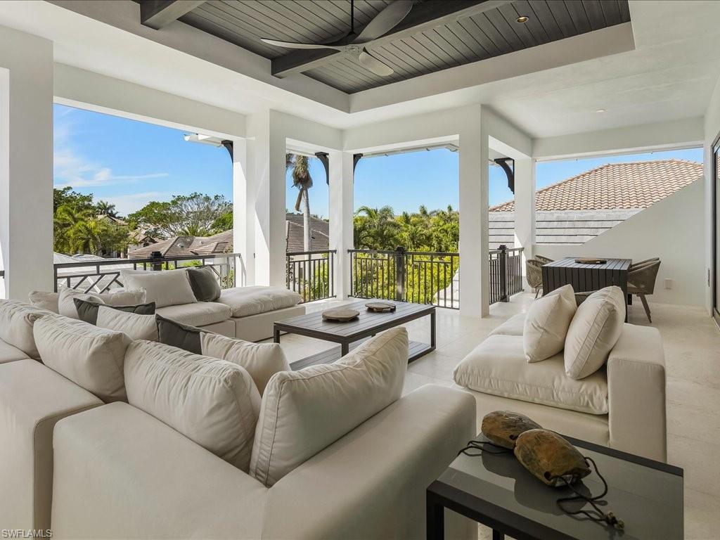 View of patio / terrace featuring an outdoor living space and a ceiling fan