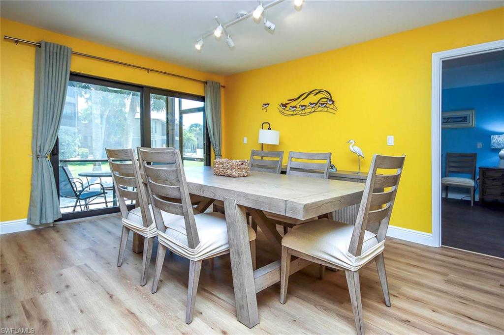 Dining space with track lighting,