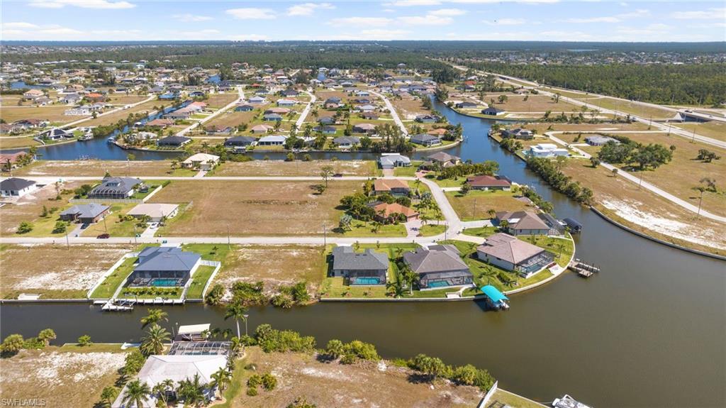 Bird's eye view with a residential view and a water view
