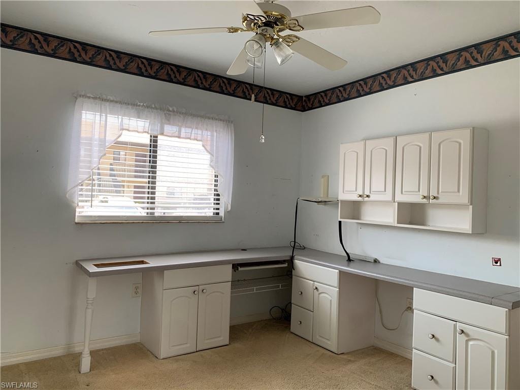 Guest Bedroom with built in desk.