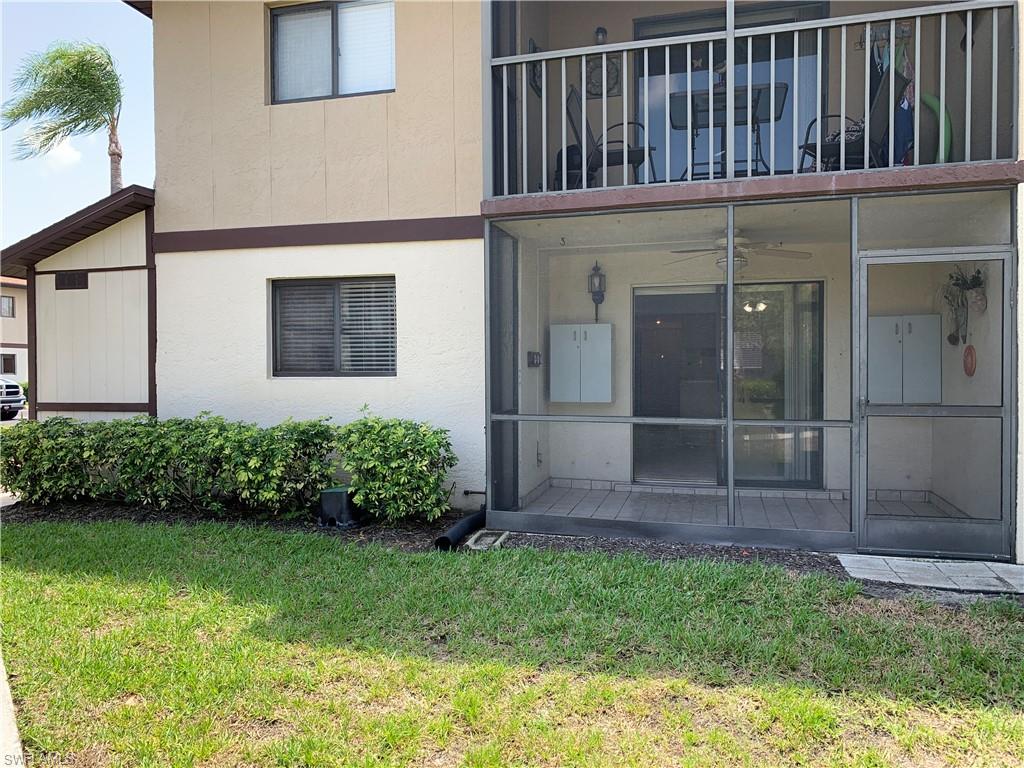 Back of house featuring a screened lanai, first floor.